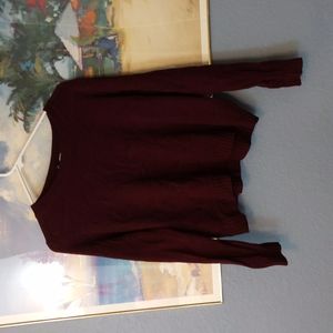 Divided maroon sweater